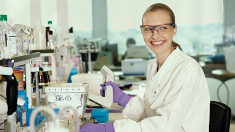 female scientist working in Stevenage research and development lab