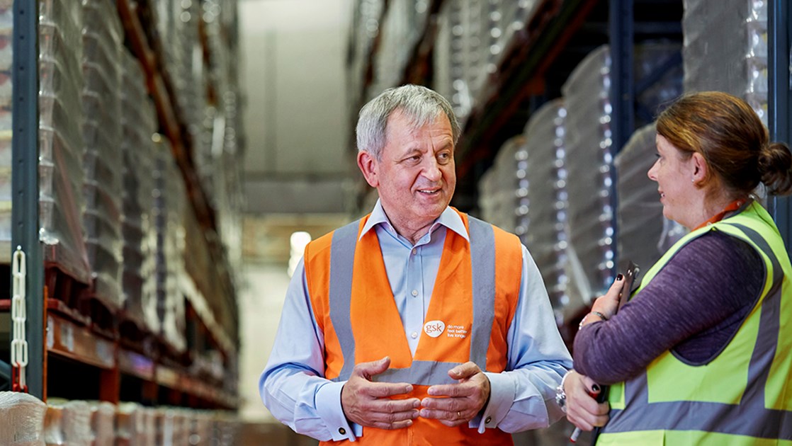 Bob Lea with colleague in warehouse