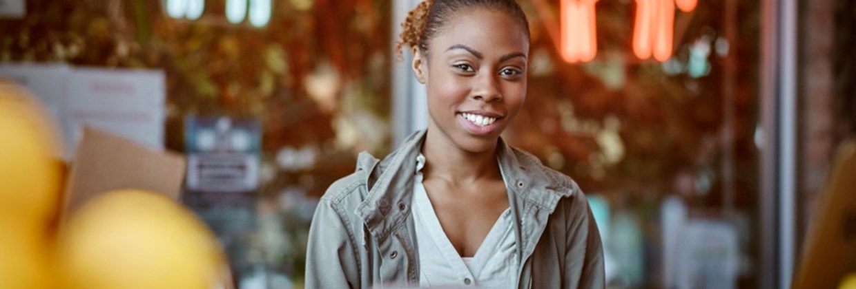 Adolescent woman smiling at camera