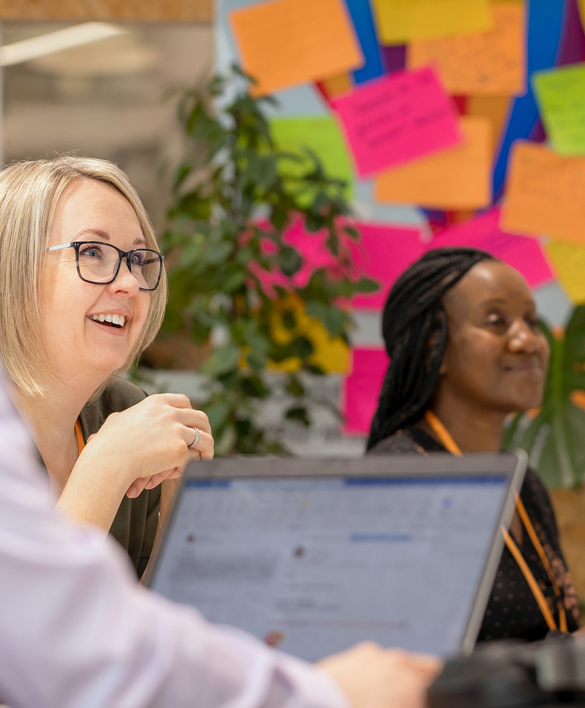People smiling during a meeting