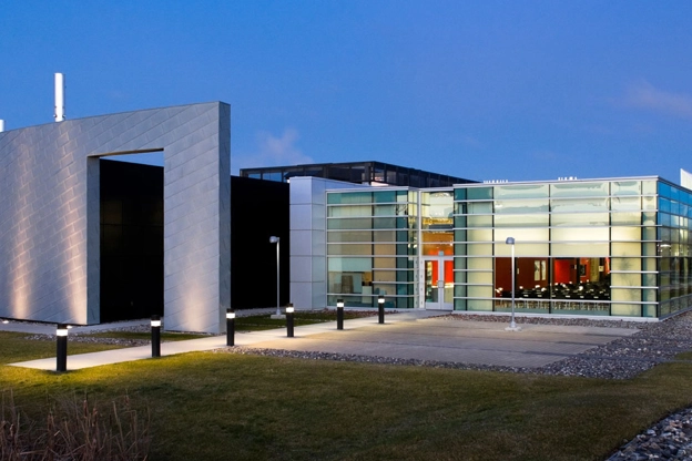 GSK Production Centre building at night